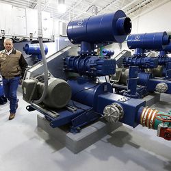Assistant general manager Darrel Scow walks through the compressor room at the Jordanelle Special Service District treatment plant, Monday, Feb. 23, 2015.

