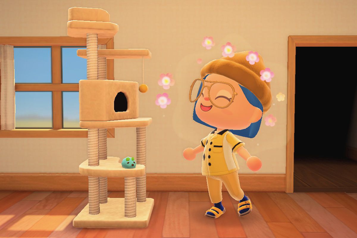 A player in Animal Crossing: New Horizons standing by a cat tower, in first-person perspective.
