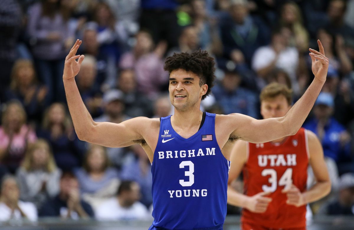 Brigham Young Cougars guard Elijah Bryant (3) hypes up the crowd after scoring on the Utah Utes at the Marriott Center in Provo on Saturday, Dec. 16, 2017.