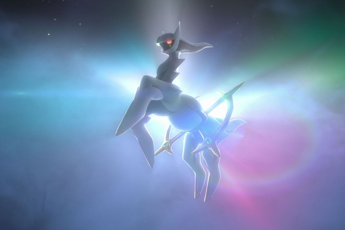 the godlike Pokémon Arceus on a rainbow background in Pokémon Legends: Arceus