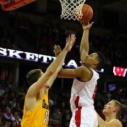 Ryan Evans goes for a layup during the exhibition game against UW-Oshkosh on November 7, 2012 at the Kohl Center.