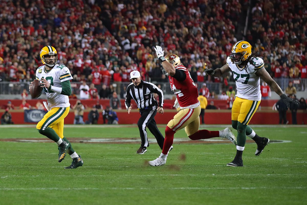 Green Bay Packers quarterback Aaron Rodgers (12) throws a touchdown against the San Francisco 49ers during the second half in the NFC Championship Game at Levi’s Stadium.&nbsp;