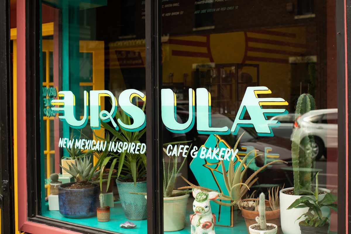 The exterior of a restaurant with the words ursula written on the front
