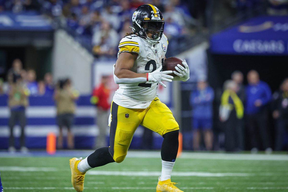 Benny Snell Jr. #24 of the Pittsburgh Steelers runs the ball during the game against the Indianapolis Colts at Lucas Oil Stadium on November 28, 2022 in Indianapolis, Indiana.