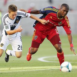 Real Salt Lake defender Kwame Watson-Siriboe (3) and Los Angeles Galaxy midfielder Michael Stephens (26) fight for the ball during an MLS game in Sandy Saturday, June 8, 2013. RSL beat L.A. 3-1.