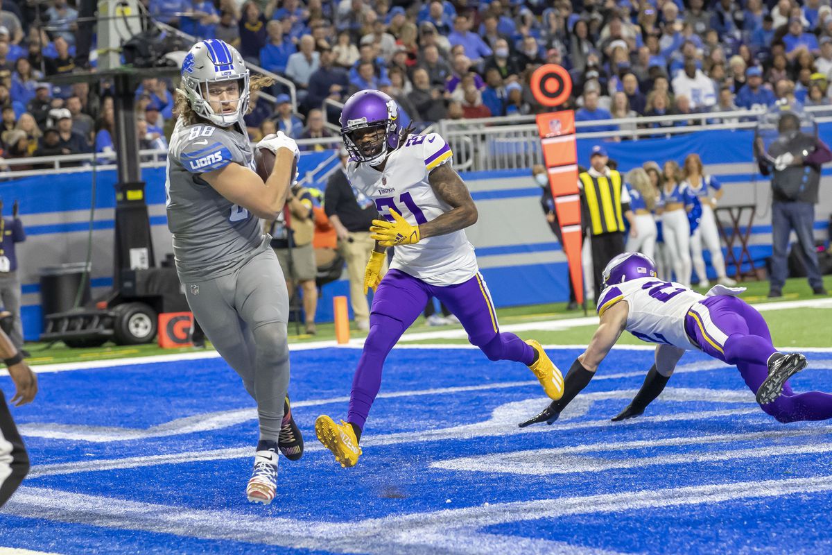 Detroit Lions tight end T.J. Hockenson (88) catches a pass for a touch down in front of Minnesota Vikings cornerback Bashaud Breeland (21) at Ford Field.