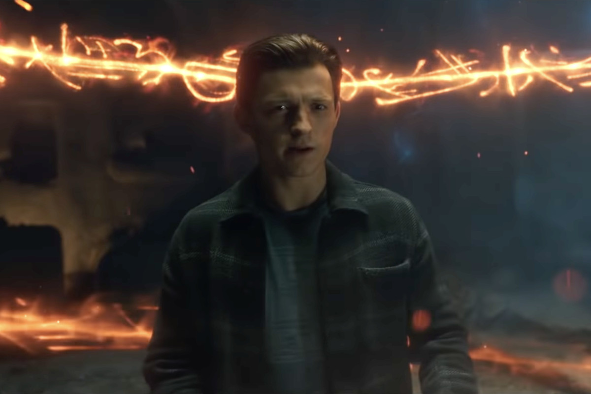 Peter Parker stands in the middle of swirling magic energy looking worried in Spider-Man: No Way Home.