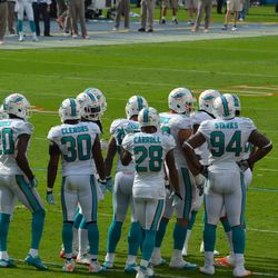 Dec. 15, 2013 Miami Gardens, FL - Miami Dolphins wide defense huddles during the second quarter of their Week 15 contest against the New England Patriots.