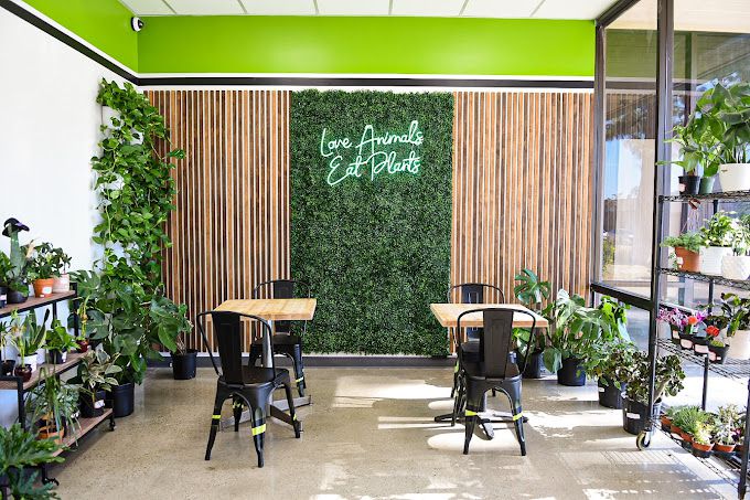 Seating area with green wall. 