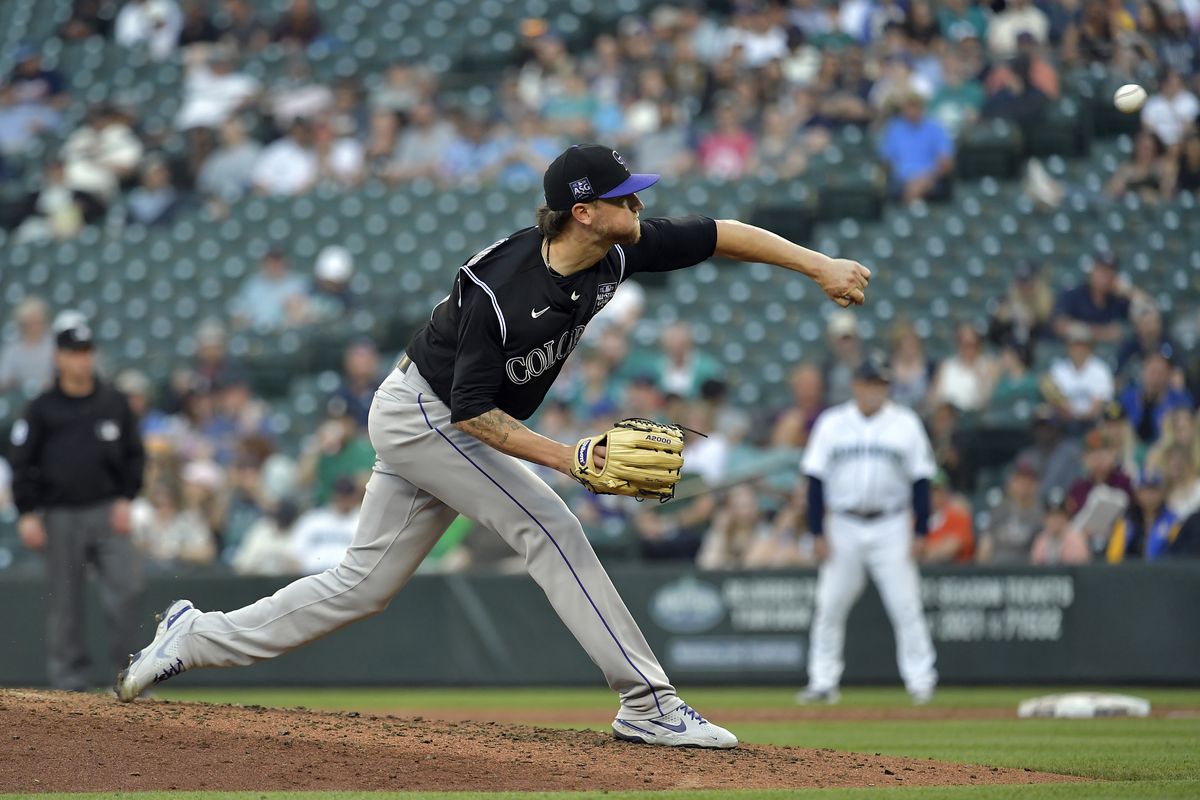 Kyle Freeland #21 of the Colorado Rockies throws a pitch during the game against the Seattle Mariners at T-Mobile Park on June 22, 2021 in Seattle, Washington.