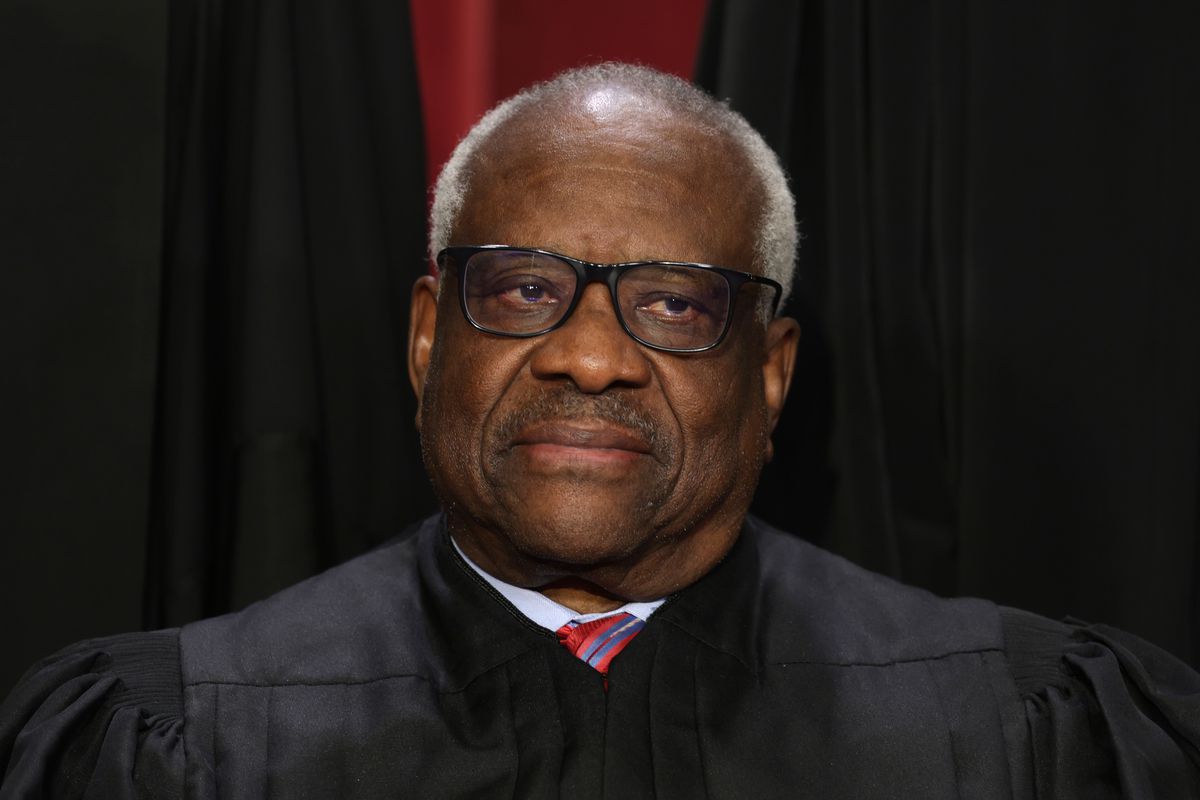 United States Supreme Court Associate Justice Clarence Thomas poses for an official portrait at the East Conference Room of the Supreme Court building on October 7, 2022 in Washington, DC