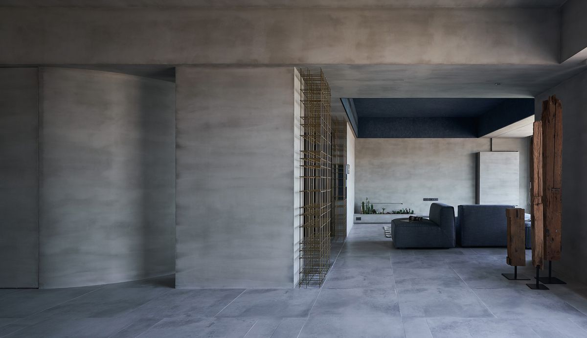 Room with concrete walls and floor
