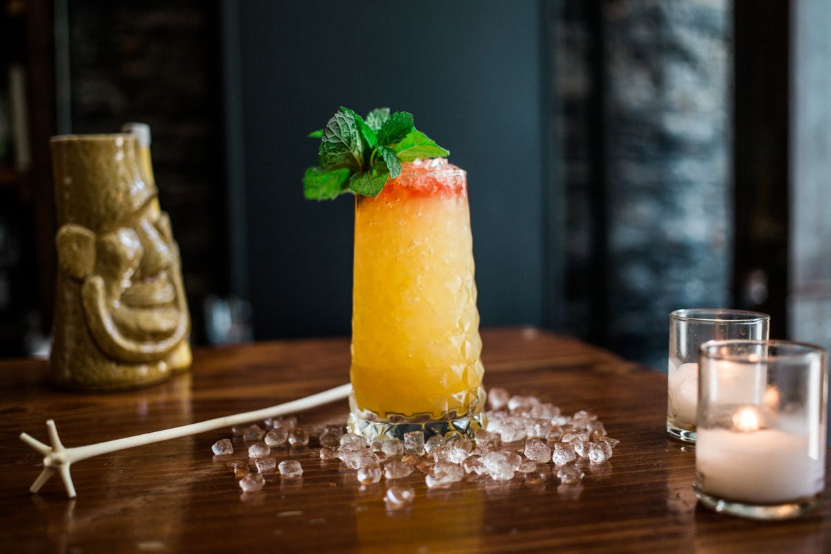 A brightly hued tiki-style drink from Pacific Cocktail Haven
