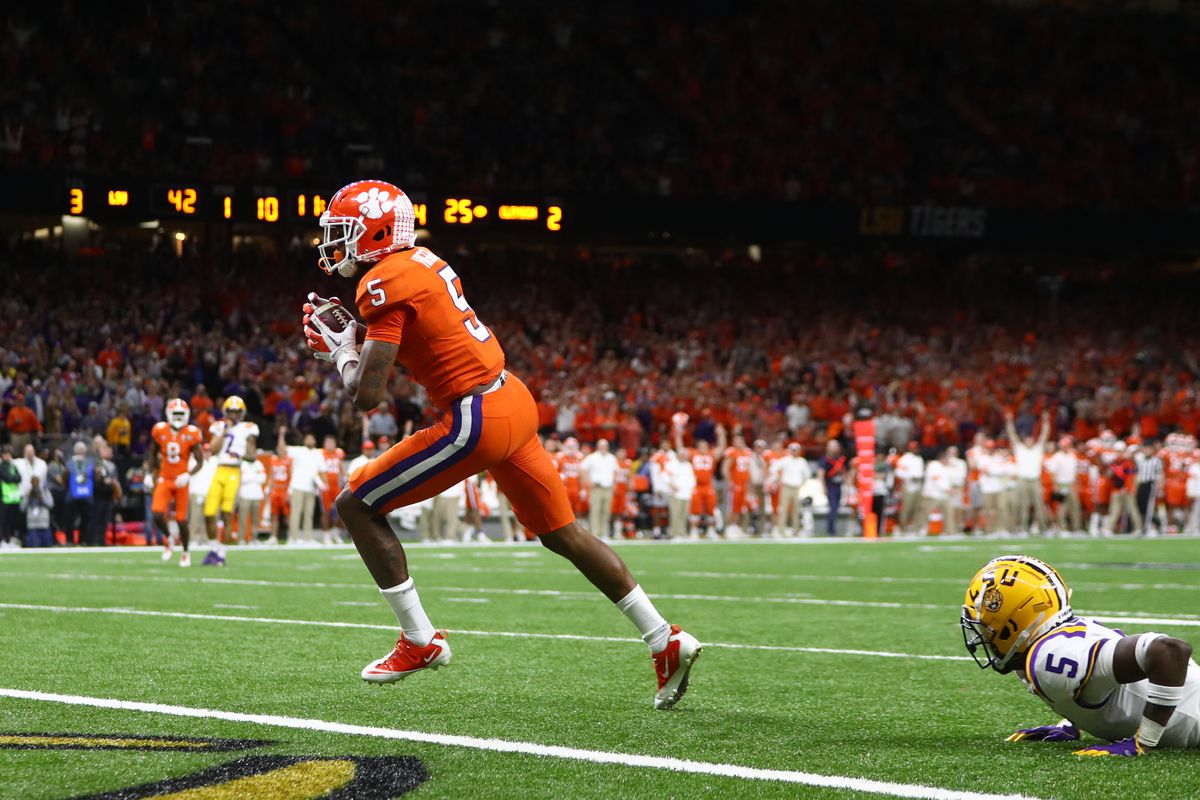 Clemson Tigers wide receiver Tee Higgins scores a touchdown in the College Football Playoff national championship game against the LSU Tigers at Mercedes-Benz Superdome.&nbsp;