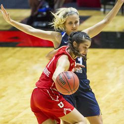 Brigham Young guard Makenzi Pulsipher (23) defends against Utah forward Malia Nawahine (3) during an NCAA women's college basketball game in Salt Lake City on Saturday, Dec. 10, 2016. Utah defeated rival Brigham Young 77-60.