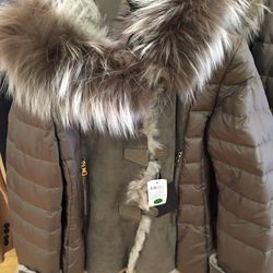 Fur hooded shearlin, $1,797 (was $2,995)