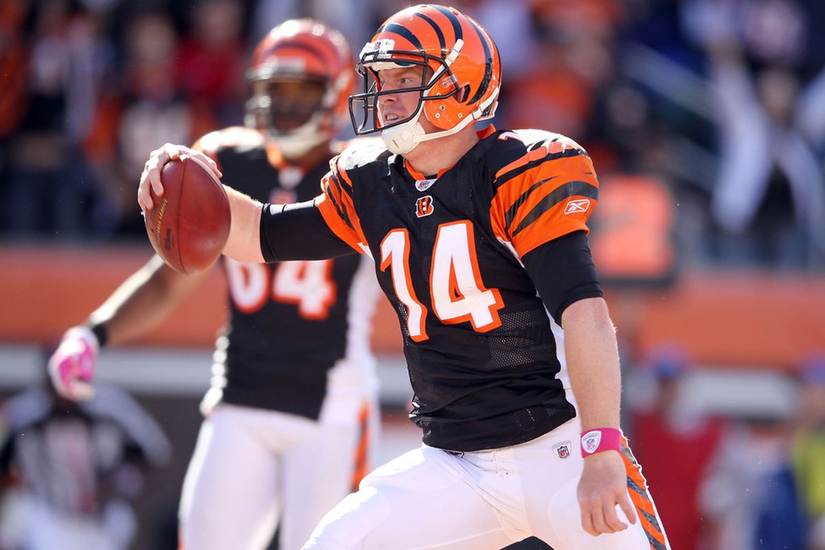 CINCINNATI, OH - OCTOBER 02:   Andy Dalton #14 of the Cincinnati Bengals runs for a touchdown  during the NFL game against the Buffalo Bills at Paul Brown Stadium on October 2, 2011 in Cincinnati, Ohio.  (Photo by Andy Lyons/Getty Images)