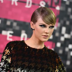 In this Sunday, Aug. 30, 2015, file photo, Taylor Swift arrives at the MTV Video Music Awards at the Microsoft Theater, in Los Angeles. A former Denver radio personality has filed a lawsuit against the singer Swift, saying he lost his job after being accused of inappropriately touching Swift during a photo session. The lawsuit was filed Thursday, Sept. 10, 2015, in U.S. District court in Denver by David Mueller.