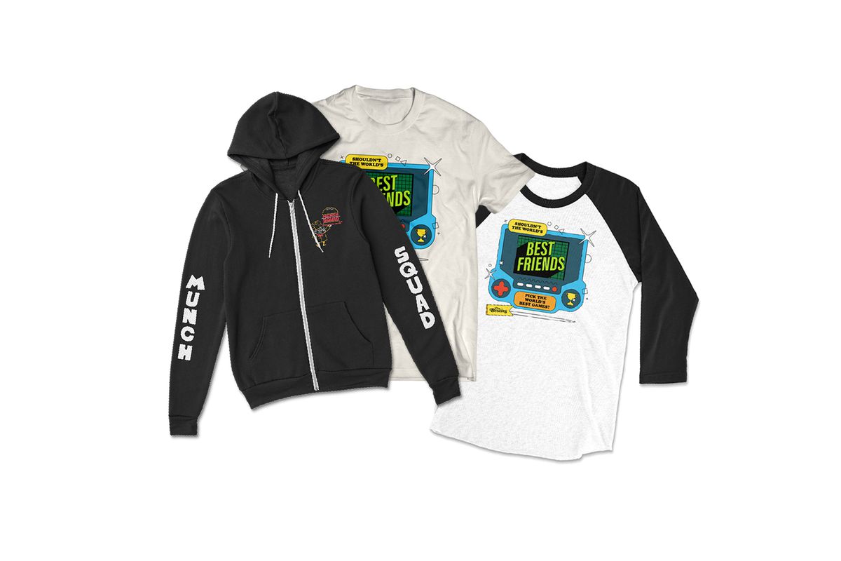 The September McElroy merch items. From left to right is a sweatshirt, a t-shirt, and a raglan. The sweatshirt is black. The left arm says “Munch” and the right arm says “Squad” in white lettering. On the right side is an illustration of a chef holding a burger. The t-shirt has a large graphic of a game system in the center. It says, “Shouldn’t the world’s best friends pick the world’s best games?” The raglan shirt has black sleeves and white torsoy with the same graphic and text as the t-shirt.