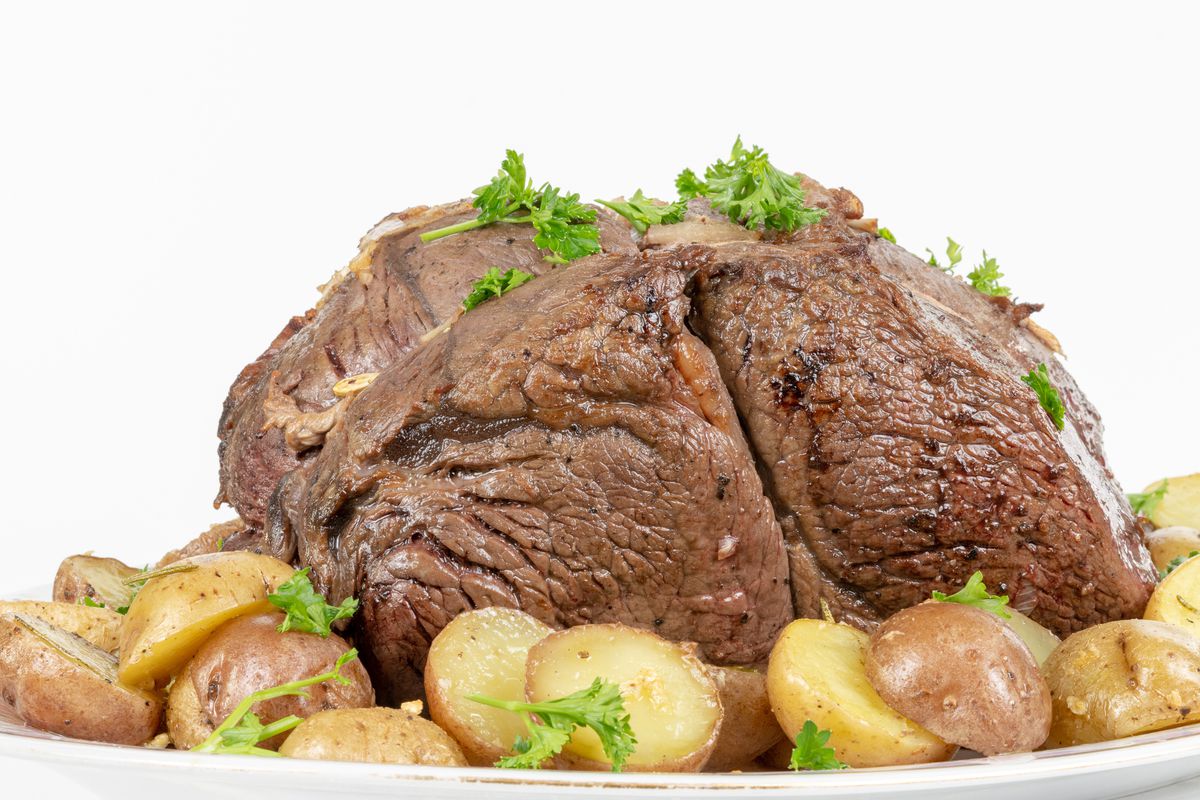 Sirloin tip roast with small potatoes. The recipe is part of...