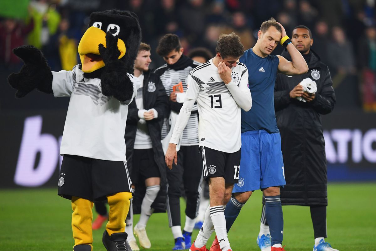 
GELSENKIRCHEN, GERMANY - NOVEMBER 19: Thomas Mueller of Germany and Manuel Neuer of Germany look dejected following their draw in the UEFA Nations League A group one match between Germany and Netherlands at Veltins-Arena on November 19, 2018 in Gelsenkirchen, Germany.