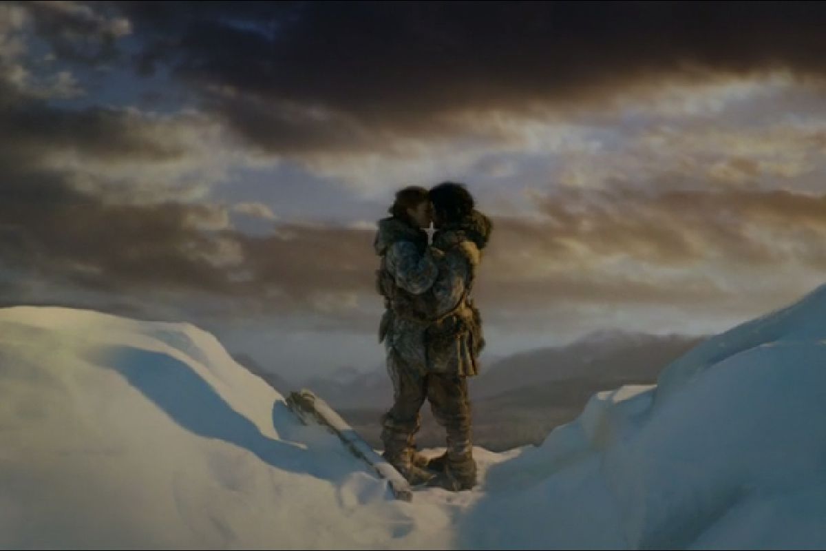 Jon Snow and Ygritte kissing atop the Wall	