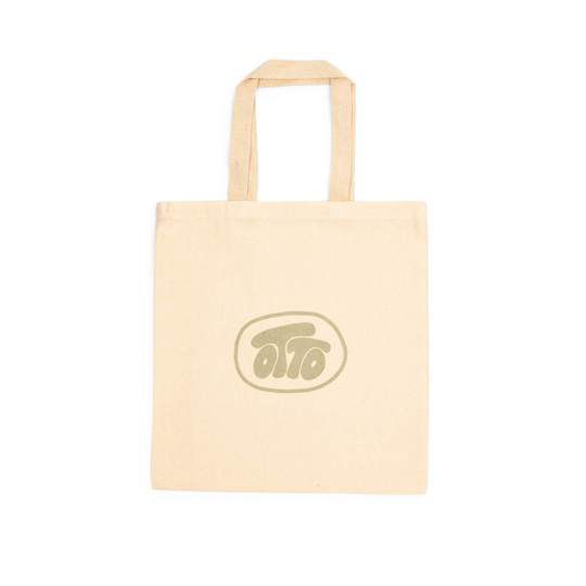 beige tote bag with “otto” logo