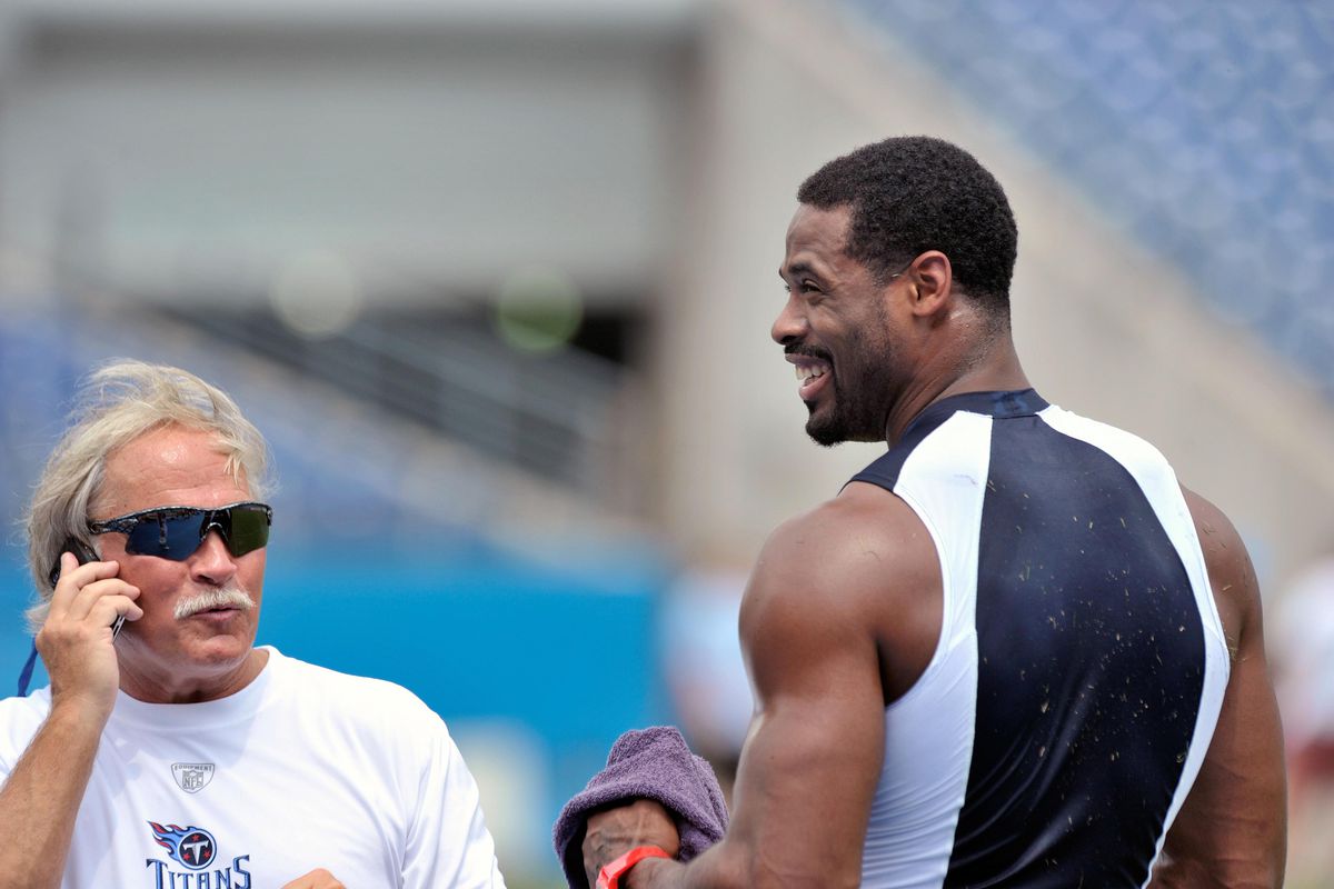 Aug 4, 2012; Nashville, TN, USA; Tennessee Titans team doctor Burton Elrod (left) on the sideline with wide receiver Kenny Britt (18) (right) during training camp workout at LP Field. Mandatory Credit: Jim Brown-US PRESSWIRE