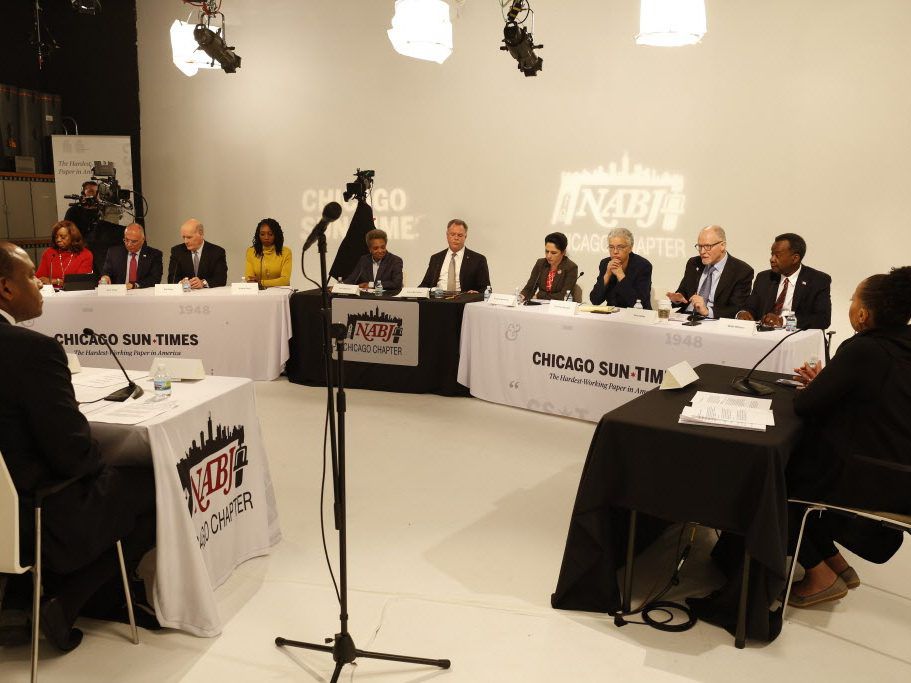 Mayoral candidates, left-right, Dorothy Brown, Gery Chico, Bill Daley, Amara Enyia, Garry McCarthy, Lori Lightfoot, Susana Mendoza, Toni Preckwinkle, Paul Vallas and Willie Wilson participate in the NABJ Mayoral Forum January 17, 2019. Also pictured are m
