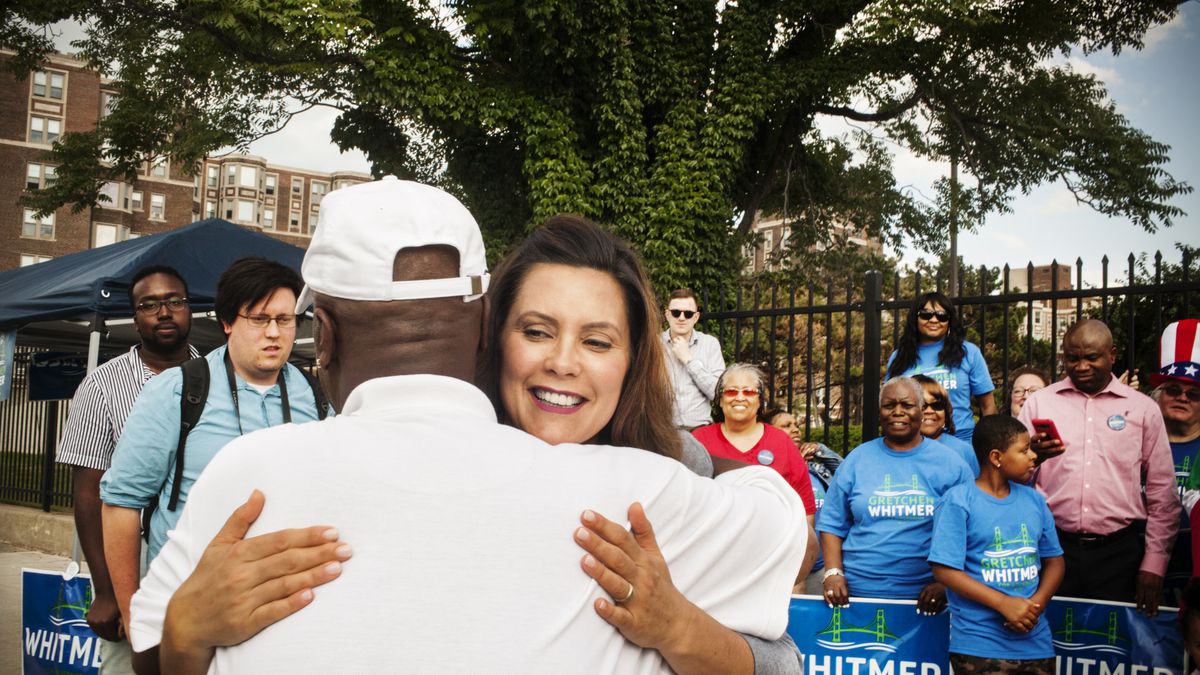 Democratic gubernatorial candidate Gretchen Whitmer hugs a supporter in Detroit, Michigan on July 28, 2018.