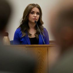 Sabrina MacNeill testifies at the trial of her adoptive father, Martin MacNeill, at 4th District Court in Provo Wednesday, Oct. 30, 2013. Martin MacNeill is charged with murder for allegedly killing his wife, Michele MacNeill, in 2007.