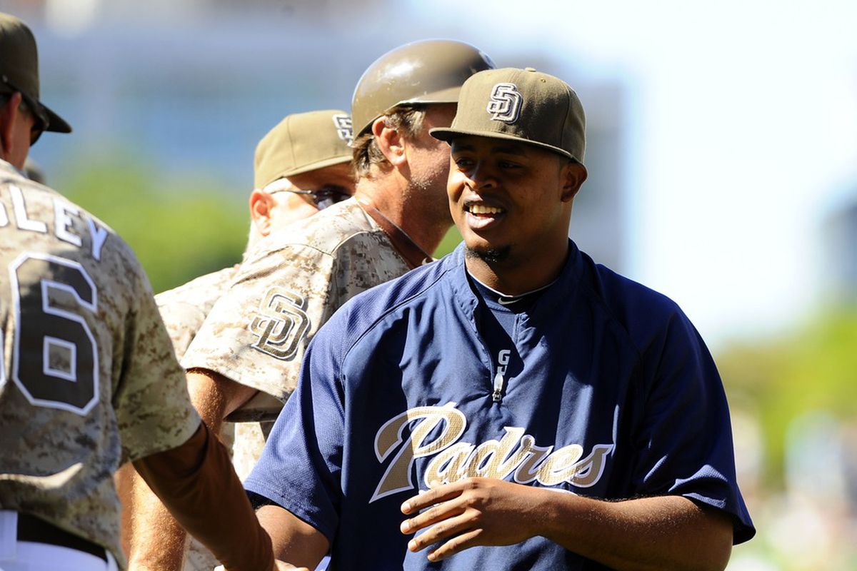 June 24, 2012; San Diego, CA, USA; San Diego Padres starting pitcher Edinson Volquez (37) is congratulated by teammates after a 2-0 win against the Seattle Mariners at Petco Park.  Mandatory Credit: Christopher Hanewinckel-US PRESSWIRE