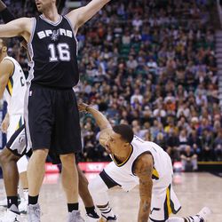 Utah Jazz guard George Hill (3) trips after shooting on San Antonio Spurs center Pau Gasol (16) during NBA action in Salt Lake City on Friday, Nov. 4, 2016. The Spurs won 100-86.