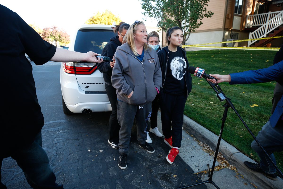 Kristina Fredrickson, second from the left, talks to members of the media about her grandmother, Carol Donlay, who was found dead in her house in Taylorsville on Friday, Oct. 23, 2020.&nbsp;Police are investigating the death of the 84-year-old woman as a homicide and have taken her daughter into custody.