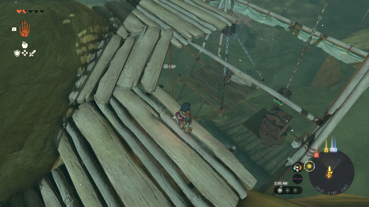 Link overlooks his manmade construction as the NPC is lifted up in Zelda: Tears of the Kingdom
