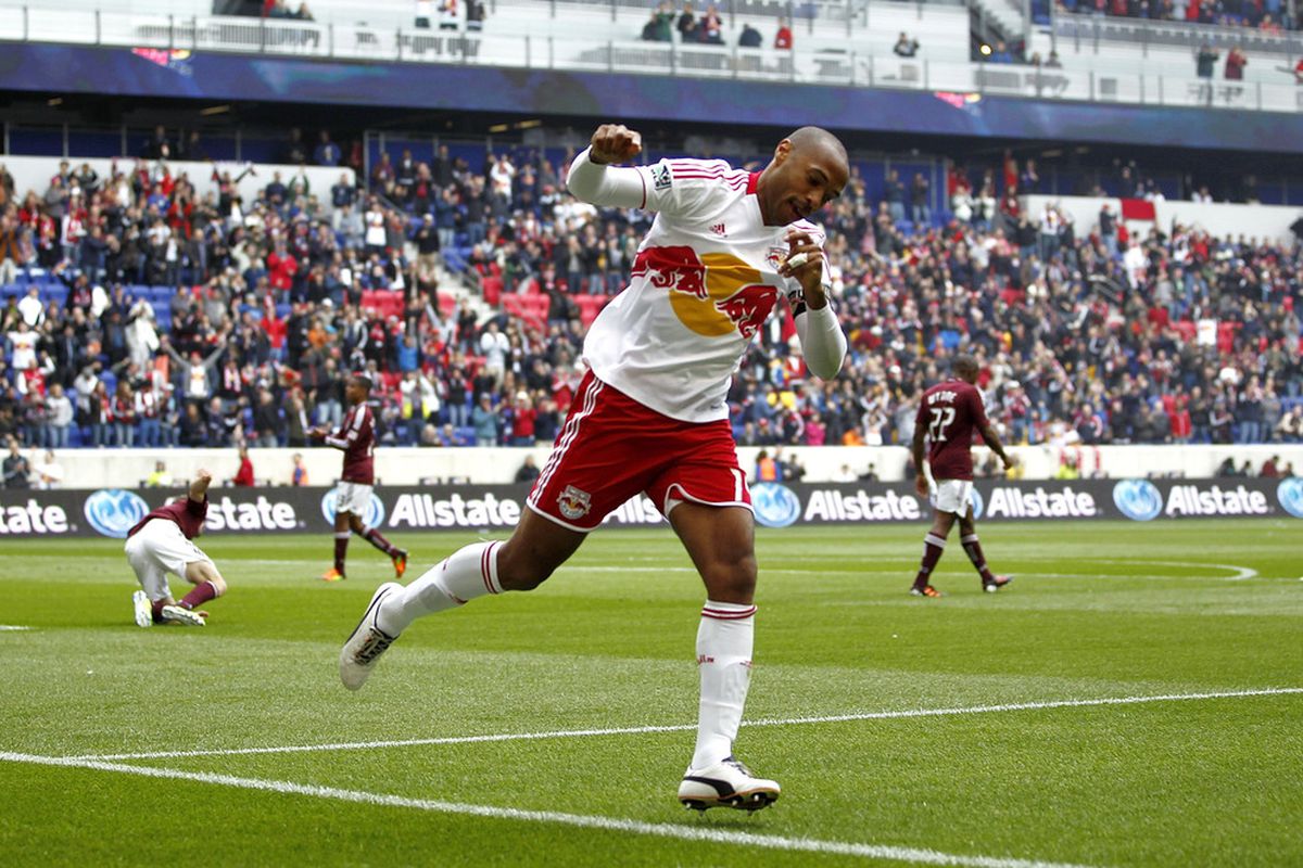 HARRISON, NJ - MARCH 25:  Thierry Henry #14 of the New York Red Bulls celebrates his goal against the Colorado Rapids during their game at Red Bull Arena on March 25, 2012 in Harrison, New Jersey.  (Photo by Jeff Zelevansky/Getty Images)