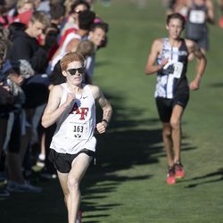 American Fork High School’s Ashton Hysell, left, races to the finish line to win the boys varsity 5K during the BYU Autumn Classic Cross Country Invitational at the East Bay Golf Course Saturday, Sept. 14, 2019 in Provo. Stansbury High’s Carson Belnap, right, took second place.