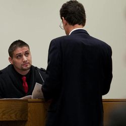 Defense attorney Randy Spencer, right, questions Jason Poirier, a former inmate who served time with Martin MacNeill, during MacNeill's trial at 4th District Court in Provo Wednesday, Nov. 6, 2013. MacNeill is charged with murder for allegedly killing his wife, Michele MacNeill, in 2007.