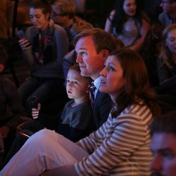 Salt Lake County Mayor Ben McAdams sits with his son, Isaac, and wife, Julie, at the Utah Democrats' election night party at the Sheraton Hotel in Salt Lake City on Tuesday, Nov. 8, 2016.
