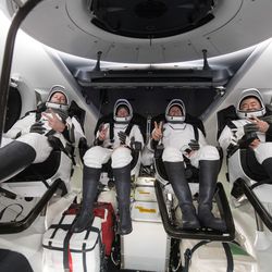 <em>The Crew-2 astronauts back on Earth just before leaving the capsule</em>