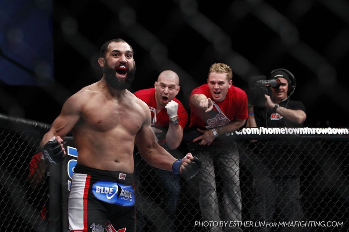 Johny Hendricks celebrates beating Jon Fitch at UFC 141. Photo by Esther Lin for <a href="http://www.mmafighting.com/photos/" target="new">MMA Fighting</a>. 