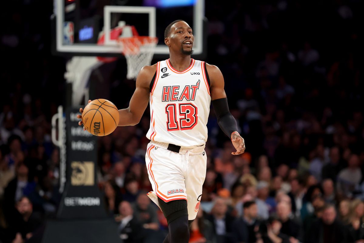 Miami Heat center Bam Adebayo (13) brings the ball up court against the New York Knicks during the first quarter at Madison Square Garden