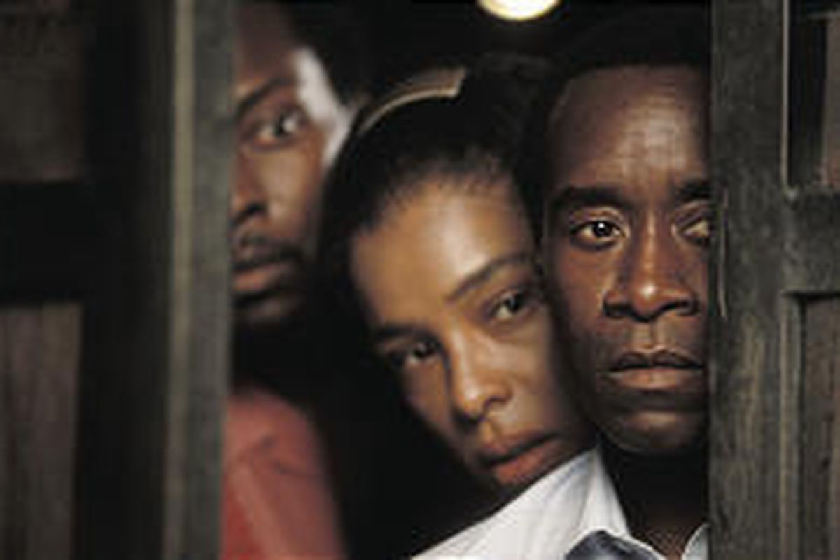 Don Cheadle stars as a hotel manager who saved nearly 1,300 Rwandans during civil war there in the '90s.
