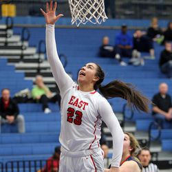 East High's Liana Kaitu'u shoots during a basketball game against Brighton in the first round of the 5A girls basketball championships at Salt Lake Community College in Taylorsville on Monday, Feb. 19, 2018. East won 49-37.