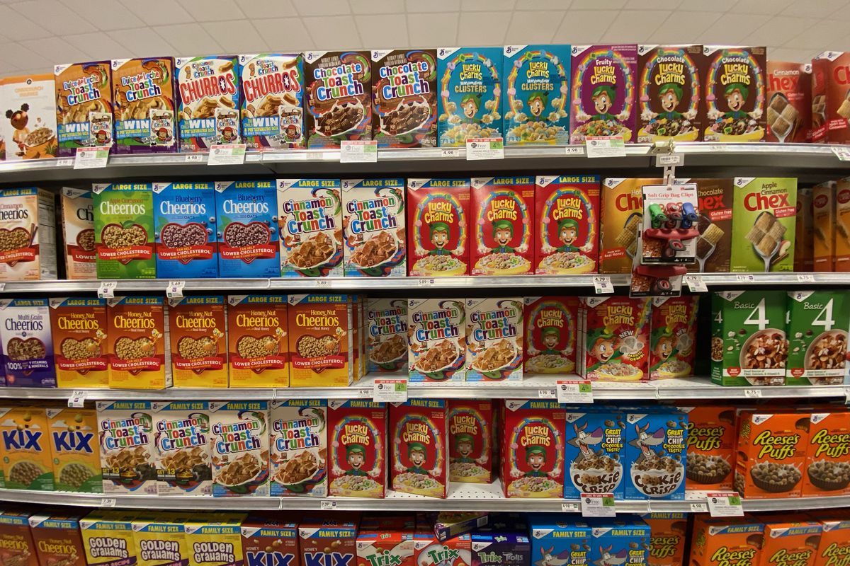 Family sized General Mills and Quaker Cereal aisle in Publix, grocery store, Florida
