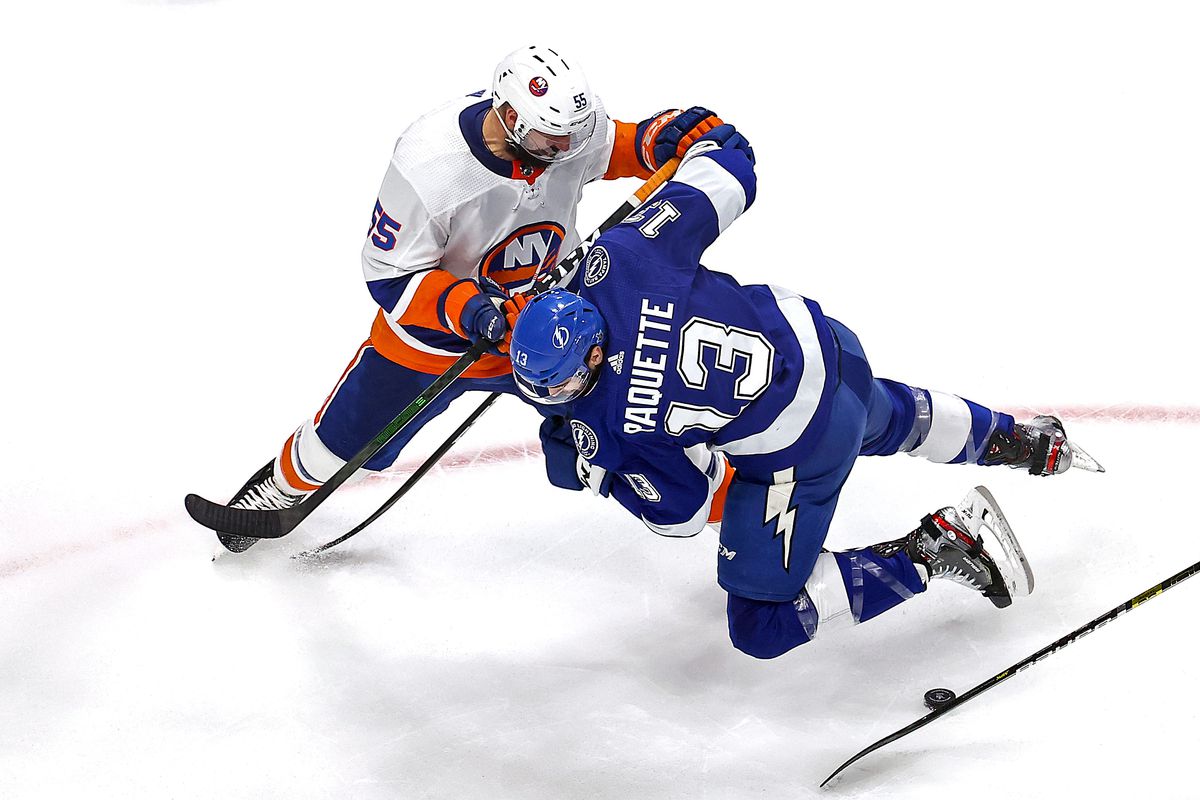 EDMONTON, ALBERTA - SEPTEMBER 15: Johnny Boychuk #55 of the New York Islanders checks Cedric Paquette #13 of the Tampa Bay Lightning during the first period in Game Five of the Eastern Conference Final during the 2020 NHL Stanley Cup Playoffs at Rogers Place on September 15, 2020 in Edmonton, Alberta, Canada.