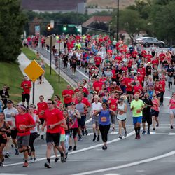 Racers in the Deseret News 10K run down Wakara Way in Salt Lake City on Tuesday, July 24, 2018.