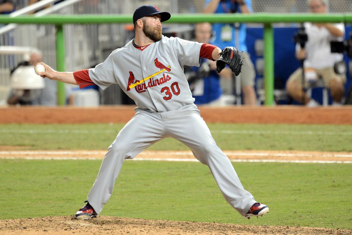 June 26, 2012; Miami, FL, USA; St. Louis Cardinals relief pitcher Jason Motte (30) throws during the ninth inning against the Miami Marlins at Marlins Park. Cardinals won 5-2. Mandatory Credit: Steve Mitchell-US PRESSWIRE
