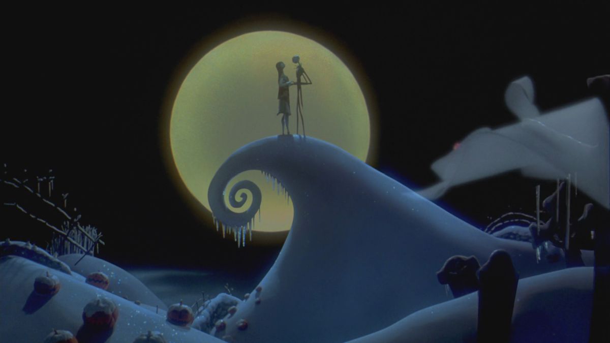 Jack Skellington and Sally the Rag Doll holding hands on Curly Hill in front of a full moon in The Nightmare Before Christmas.