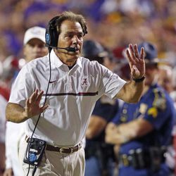 Alabama head coach Nick Saban tries to get the referee's attention as the play clock approaches zero in the second half of an NCAA college football game against LSU in Baton Rouge, La., Saturday, Nov. 5, 2016. Alabama won 10-0. 